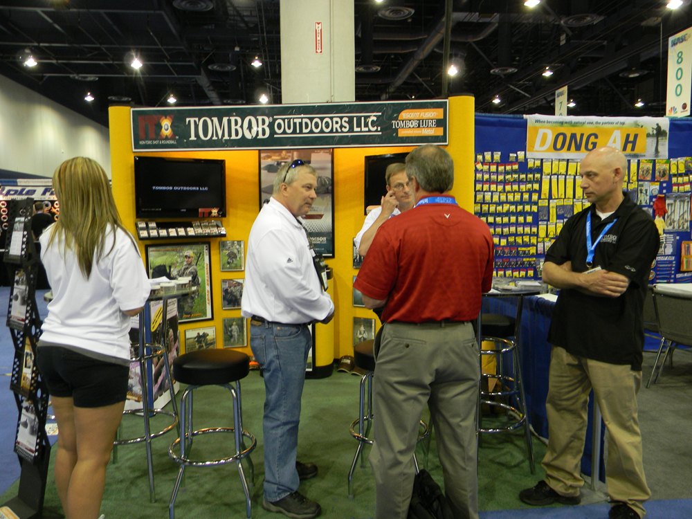 Brad Clinton and Tim and Ivan Smith from CMT and TomBob Outdoors at the ICast fishing trade show in Las Vegas.  