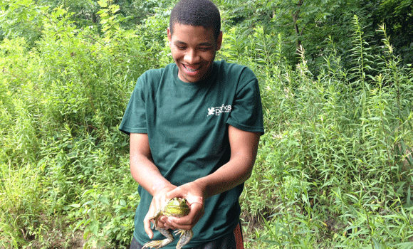 Young naturalist Kevin Tyler befriends a bullfrog