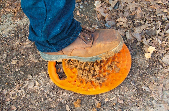 The MudKill MudFlinger, a patented, portable boot cleaning device